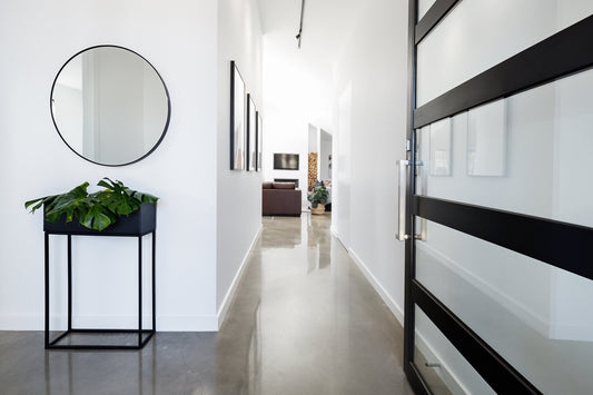 How to Frame a Mirror Without Taking It Off the Wall
